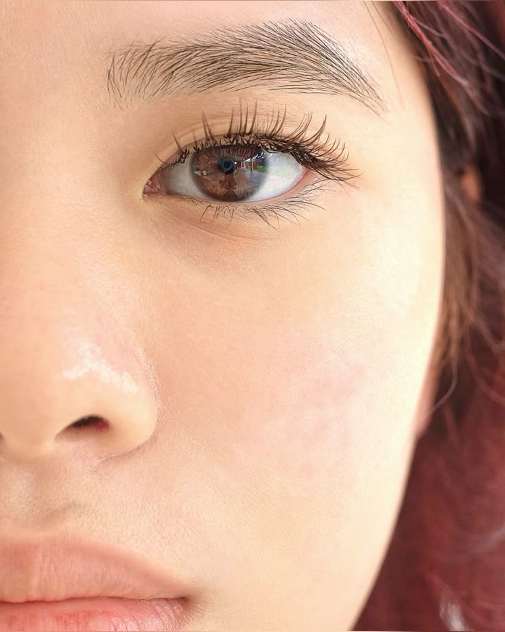 “After” shot of client relaxing post-treatment, smiling naturally in spa lighting. “After” shot of client relaxing post-treatment, smiling naturally in spa lighting.